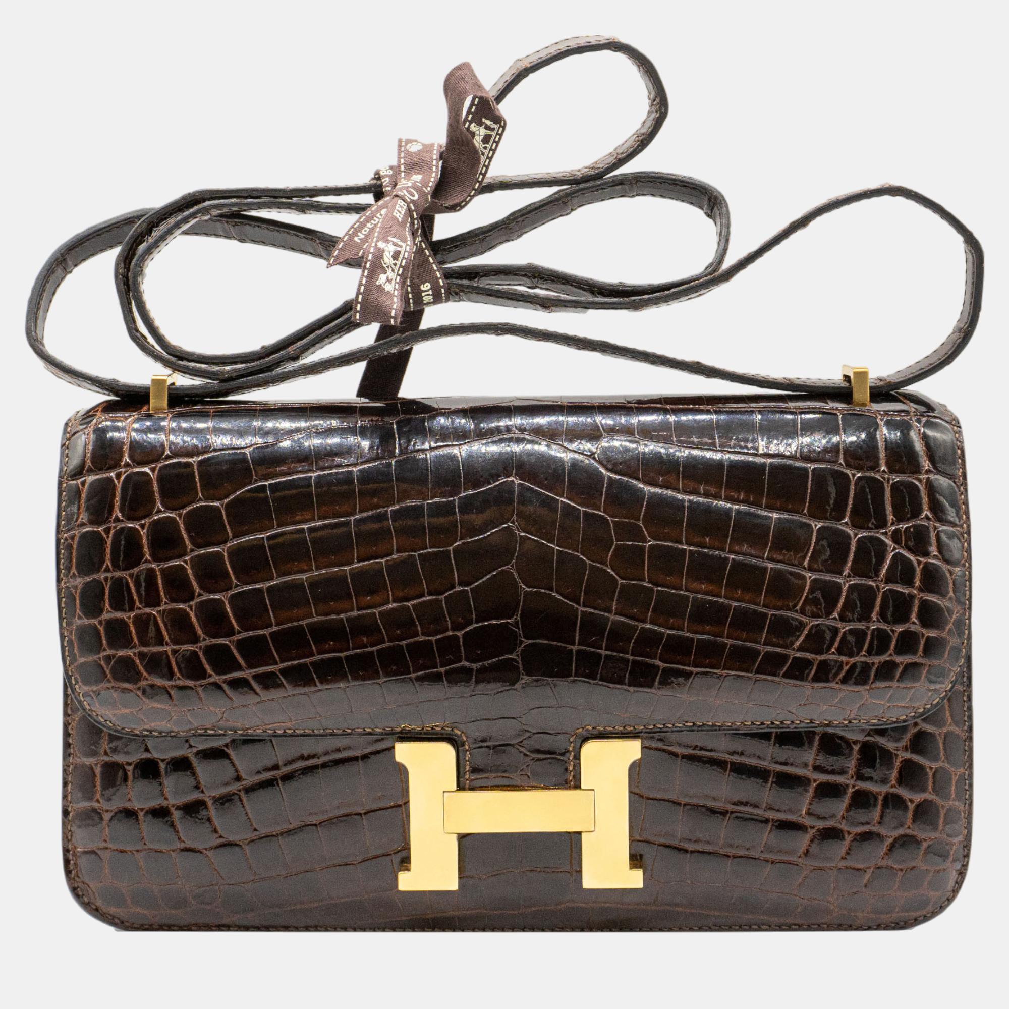 hermès constance elan 25 in shiny brown nilo croc ghw bag